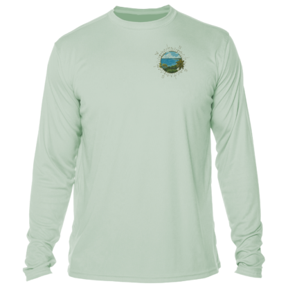 The men's long sleeve performance shirt has an image of a mountain and a lake.