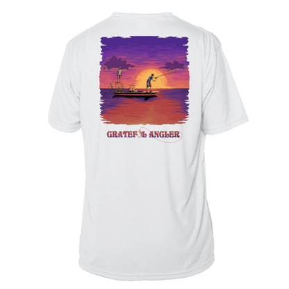 A Grateful Angler Skeleton Anglers Short Sleeve UV Shirt with an image of a boat at sunset.