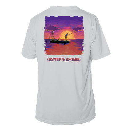 A Grateful Angler Skeleton Anglers Short Sleeve UV Shirt with an image of a man fishing at sunset.