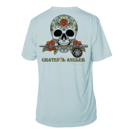 A light blue Grateful Angler Fly Fishing Sugar Skull Short Sleeve UV Shirt with skull and roses on it.