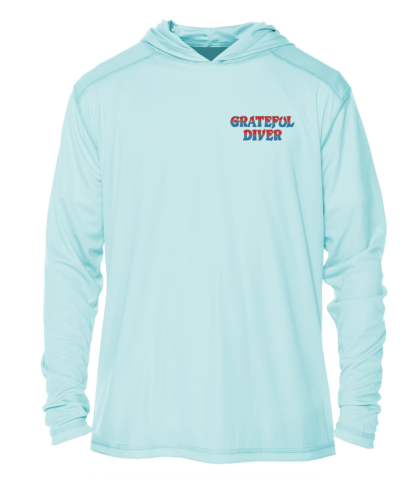 A light blue Grateful Diver Aloha Turtle UV Hoodie with the words grateful diver on it.
