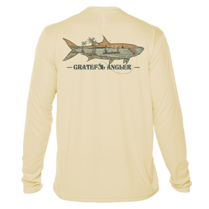 A long-sleeved Grateful Angler Keys Tarpon UV Shirt with an image of a shark on it.