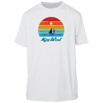 A white t - shirt with an image of a sailboat and sunset.