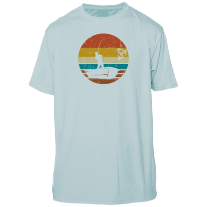 A light blue t - shirt with an image of a fishing boat and sunset.