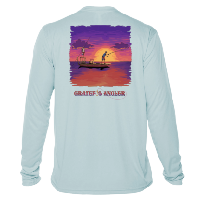 A Grateful Angler Skeleton Anglers UV Shirt with an image of a boat at sunset.