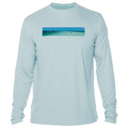 A long-sleeved sun shirt with an image of the ocean.