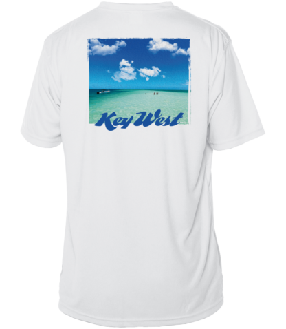 A white sun shirt with an image of the beach and a blue sky.