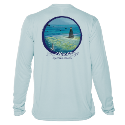 A sun protective rash guard with an image of the ocean and a lighthouse.