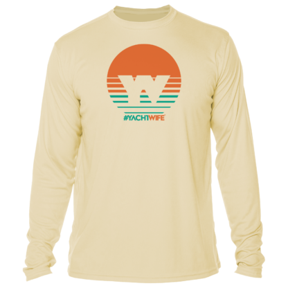 A sun shirt with an orange and green sunset, offering UPF protection.
