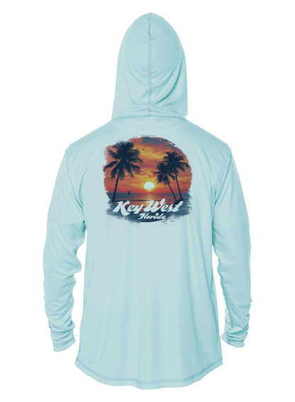 A blue hoodie with palm trees and a sunset, perfect for sun protection.