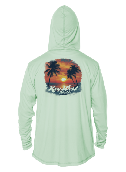 A green hoodie with palm trees and a sunset, perfect for sun protection as a UV shirt.