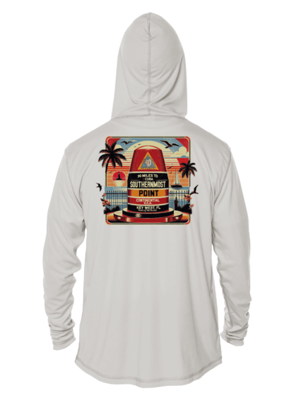 A white hoodie with an image of a beach and palm trees, offering sun protective clothing.
