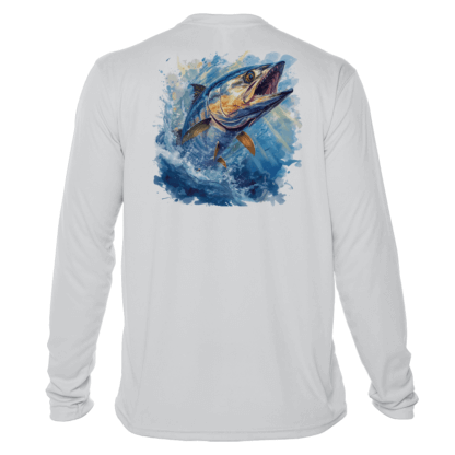 A white long-sleeve fishing shirt featuring an image of a fish leaping from the water.